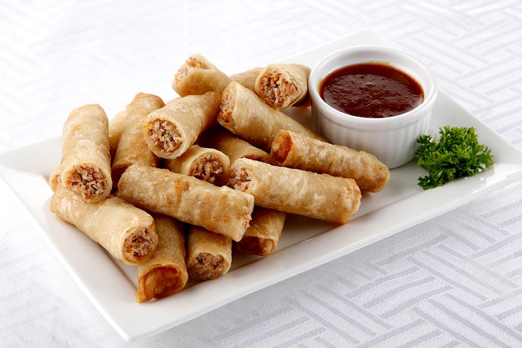 this picture shows a taste of manila filipino food lumpia